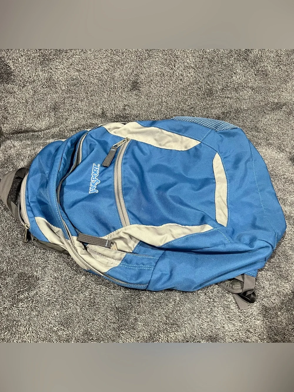 Blue Jansport Backpack unisex
